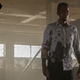 Chris Rock wearing a bloody shirt in new Saw sequel Spiral.